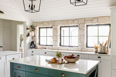 Inspiration for a country l-shaped kitchen in San Diego with shaker cabinets, white cabinets, medium hardwood floors, with island, brown floor and white benchtop.
