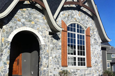 Inspiration for a transitional exterior home remodel in Other