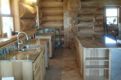 Example of a mountain style kitchen design in Orange County