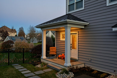 Mid-sized transitional slate floor, gray floor and exposed beam entryway photo in Philadelphia with gray walls and a glass front door