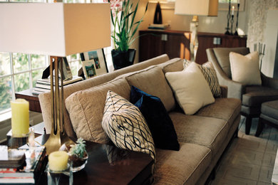 Living room - large contemporary open concept medium tone wood floor living room idea in Raleigh with white walls, a standard fireplace, a stone fireplace and a media wall