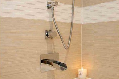 Small transitional beige tile and stone tile travertine floor bathroom photo in Toronto with a vessel sink, furniture-like cabinets, medium tone wood cabinets, a one-piece toilet and blue walls