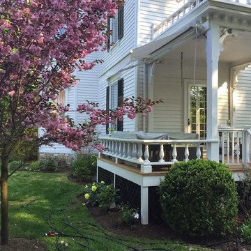 2 Aristocrat Eko Retractable Awnings Installed Over Back Deck