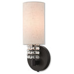 Livex Lighting - Livex Lighting Carlisle English Bronze Light ADA Wall Sconce - This contemporary style wall sconce from the Carlisle collection features an English bronze finish with hanging strands of beautiful clear crystals. The crystal drapes from a hand crafted oatmeal fabric hardback shade and creates a magnificent sophisticated look.