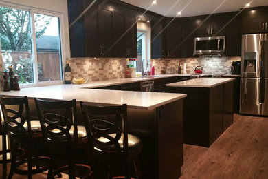 Example of a minimalist kitchen design in Vancouver