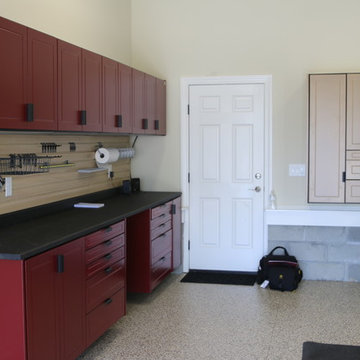 Deep, single wide garage features work bench and exercise area
