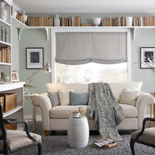 Sofa in front of window