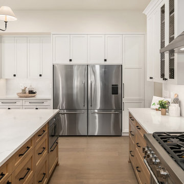 Kitchen Featuring Ample Amount of Storage and Large Fridge