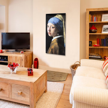 Casual family room with de Young Art Museum "Girl with a Pearl Earring" Banner