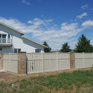 Semi- private vinyl fence with pillars