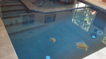 Luxury swimming pool renovation - Glass pool, glass bead plaster, glass tile