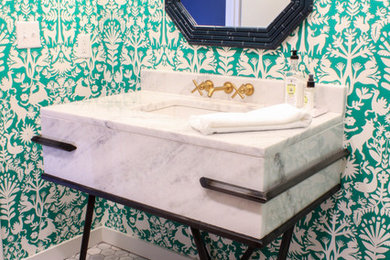 Inspiration for a mid-sized eclectic marble floor and gray floor powder room remodel in Austin with a console sink, marble countertops and blue walls