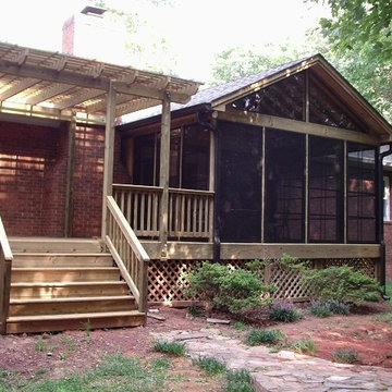Bronze Eze Breeze Windows with Wood Deck and Pergola
