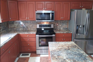 Inspiration for a craftsman l-shaped eat-in kitchen remodel in Other with an island
