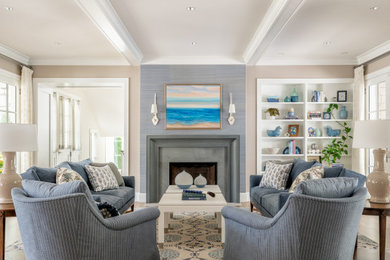 Inspiration for a mid-sized contemporary open concept medium tone wood floor, brown floor and coffered ceiling living room remodel in Minneapolis with beige walls and a standard fireplace