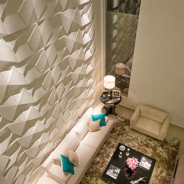 Contemporary living room with high ceilings and cement wall panels