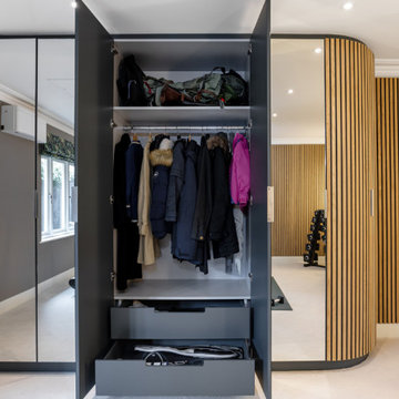 BESPOKE MIRRORED CABINETRY AND WALL PANELLING FOR A LUXURY HOME GYM