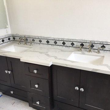 Espresso shaker bathroom vanity with Calacatta Gold quartz bathroom countertop