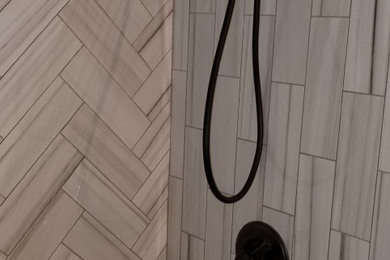 Example of a minimalist ceramic tile bathroom design in Salt Lake City