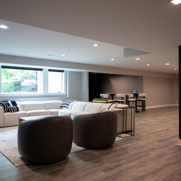 Finished Basement with Seated Bar, Wine Room and Golf Simulator in Rochester, MI