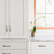 back splash with grey cabinets