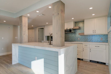 Example of a mid-sized beach style kitchen design in Miami