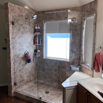 River Rock smooth wall shower with frameless door