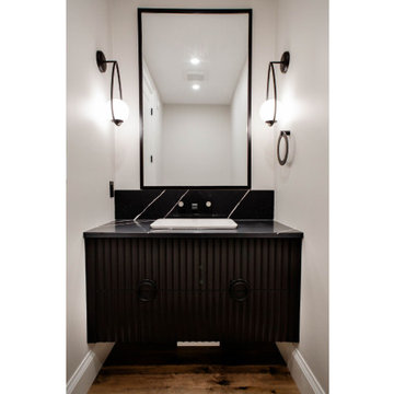 Modern Powder Room with Black Sophisticated Accents