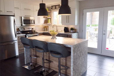 Example of a mid-sized trendy u-shaped ceramic tile eat-in kitchen design in Ottawa with a double-bowl sink, flat-panel cabinets, white cabinets, laminate countertops, white backsplash, ceramic backsplash, stainless steel appliances and an island
