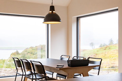 Inspiration for a contemporary dining room in Gloucestershire.