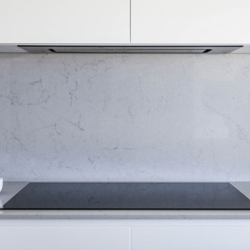 Induction cooktop with grey stone benchtop