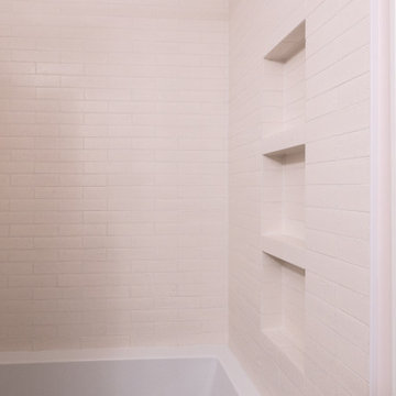 Playful Guest Bath Remodel with Fun Tile and Mixed Metals