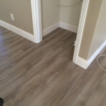 Delaware Bay Driftwood 10 mm laminate with attached underlayment