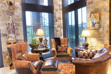 Example of a mid-sized eclectic open concept beige floor family room design in Austin with beige walls and no fireplace