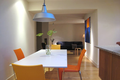 Photo of a contemporary dining room in London.