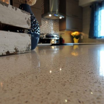 Melamine kitchen with quartz waterfall counter top
