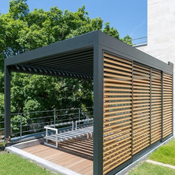 Modern terrace cover enclosed with wooden shading panels - Awnings