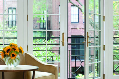 Inspiration for a transitional living room remodel in Orlando with white walls
