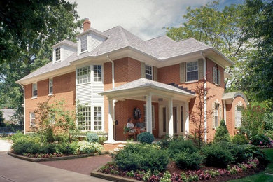 Example of a transitional exterior home design in Cleveland