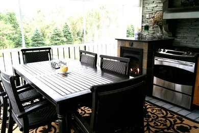 Example of an arts and crafts patio design in Philadelphia