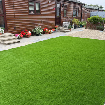 Artificial Grass Run Up to Park Home Steps and Beds