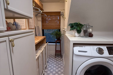 Example of a french country laundry room design in Sacramento