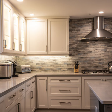Transitional Two-Tone Kitchen | Shaker Cabinetry & Glass Mosaic Backsplash