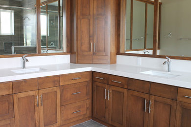 Bathroom - small asian master porcelain tile bathroom idea in San Luis Obispo with an undermount sink, flat-panel cabinets, medium tone wood cabinets and granite countertops