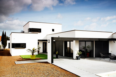Aménagement d'une façade de maison bord de mer.