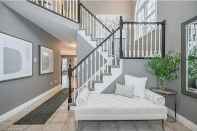 Entryway - contemporary entryway idea in Toronto