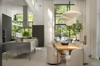 Inspiration for a contemporary gray floor dining room remodel in Atlanta with white walls