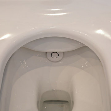Eine Saune mit Dusche wird zu einem Duschbad in München Bogenhausen