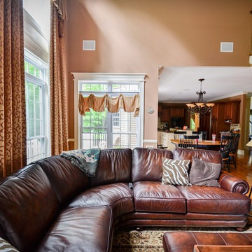 Traditional Family Room with Cathedral Ceiling