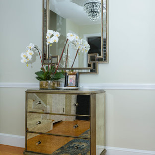 Design ideas for a mid-sized eclectic front door in Boston with beige walls, light hardwood floors, a single front door and a brown front door.
